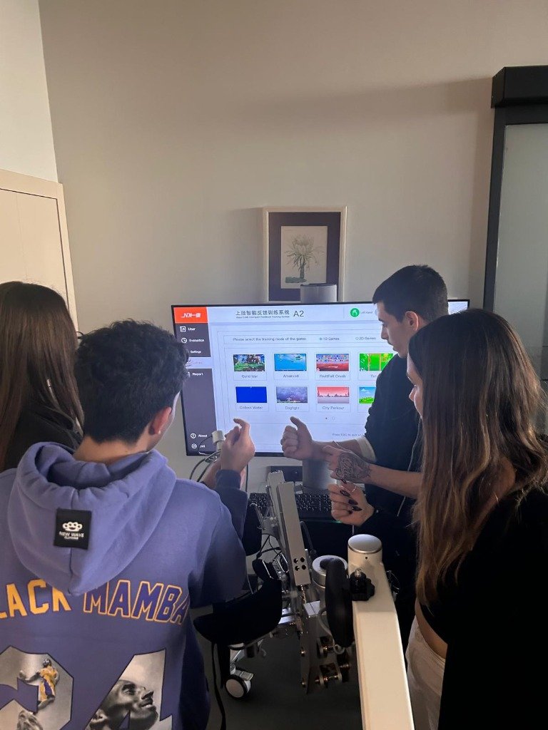 Students trying rehabilitation equipment